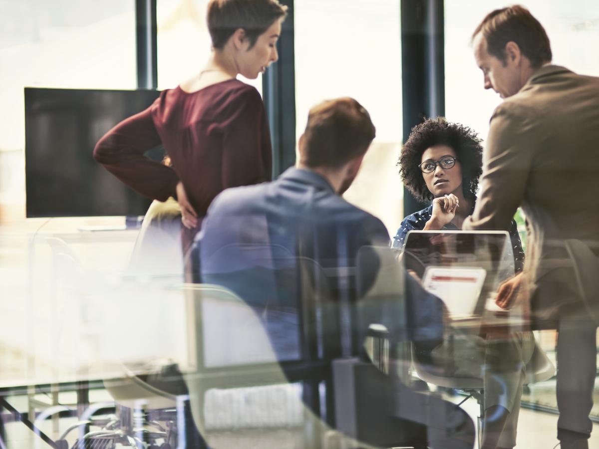 employees discussing about stuff instead of working