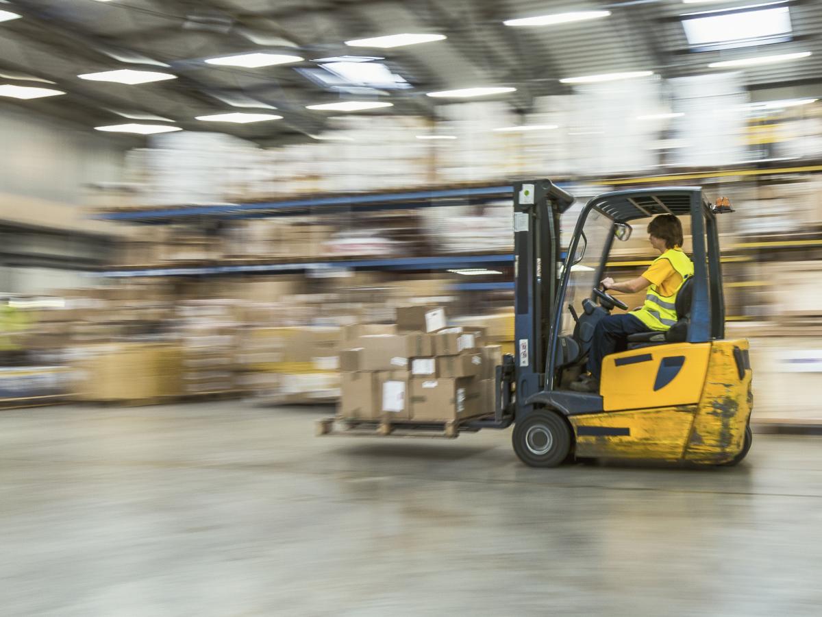 machine with wheel in warehouse